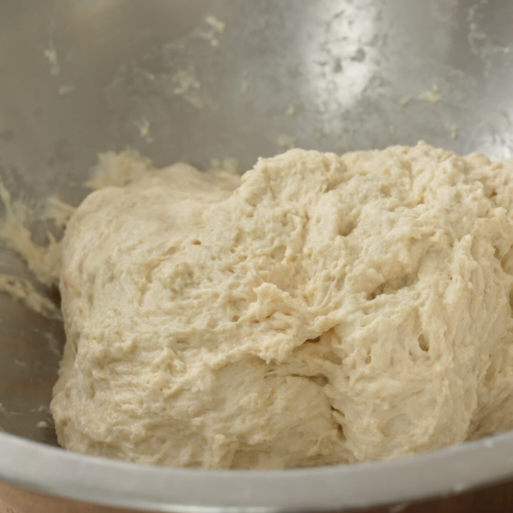 mixed dough in silver bowl