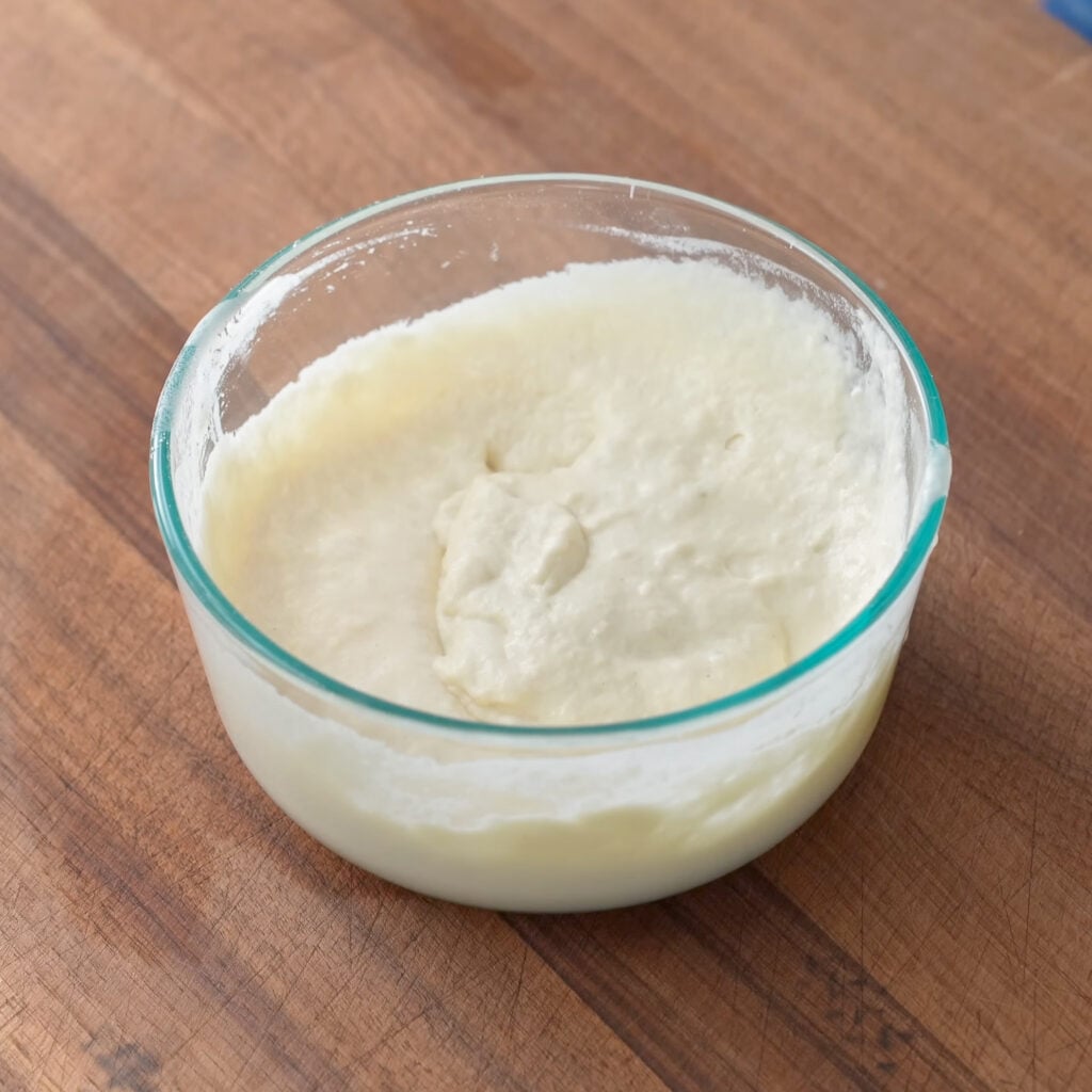 mixed poolish in glass container