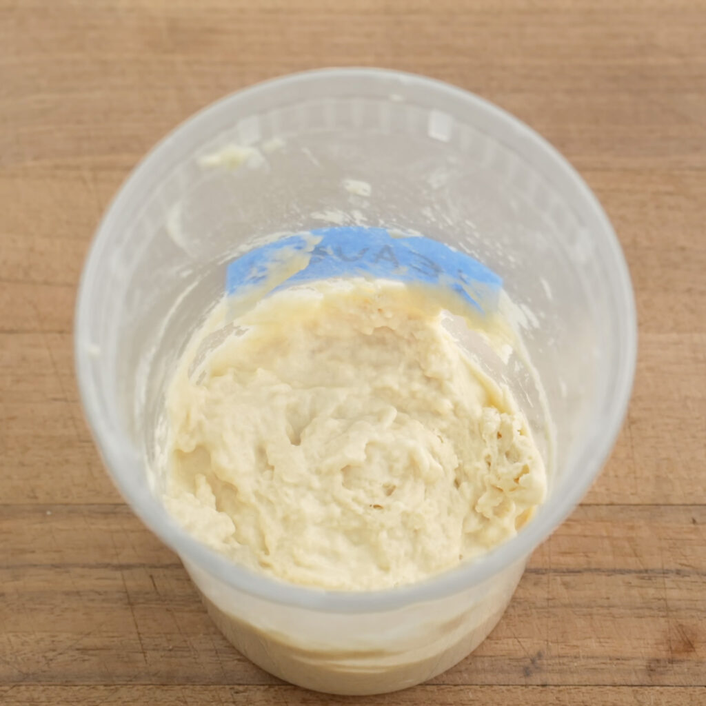 mixed leaven in clear deli container