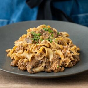 mound of ground beef stroganoff in grey bowl