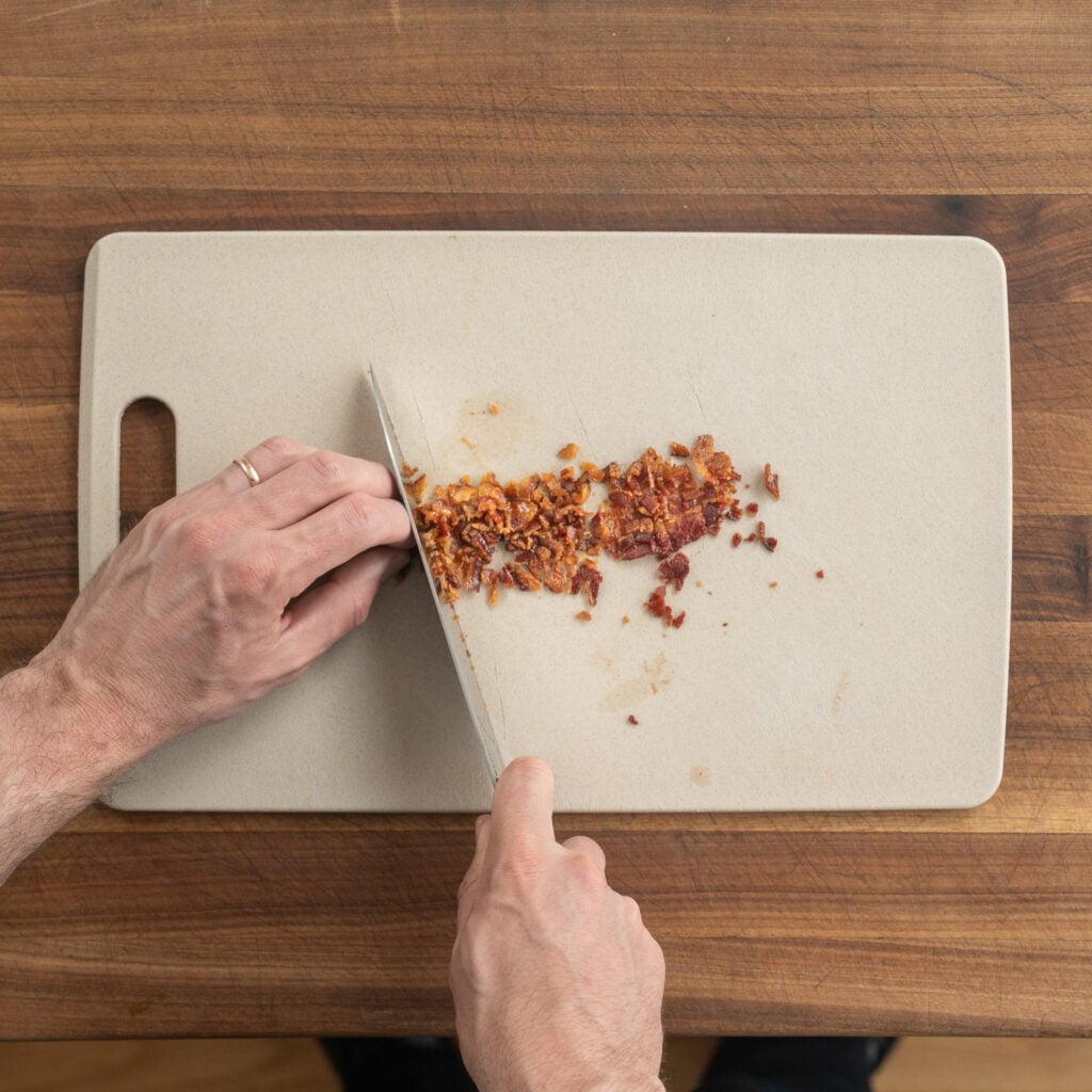 dicing bacon on cutting board