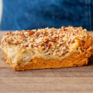 piece of pumpkin crunch on wood cutting board