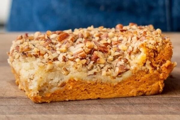 piece of pumpkin crunch on wood cutting board