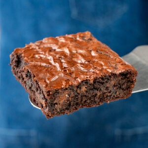 brownie with blue apron background