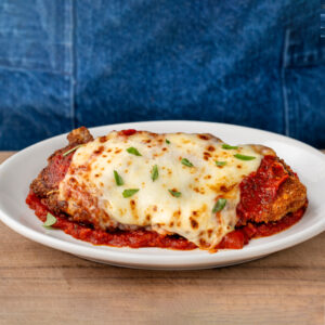 chicken parmesan on a white plate