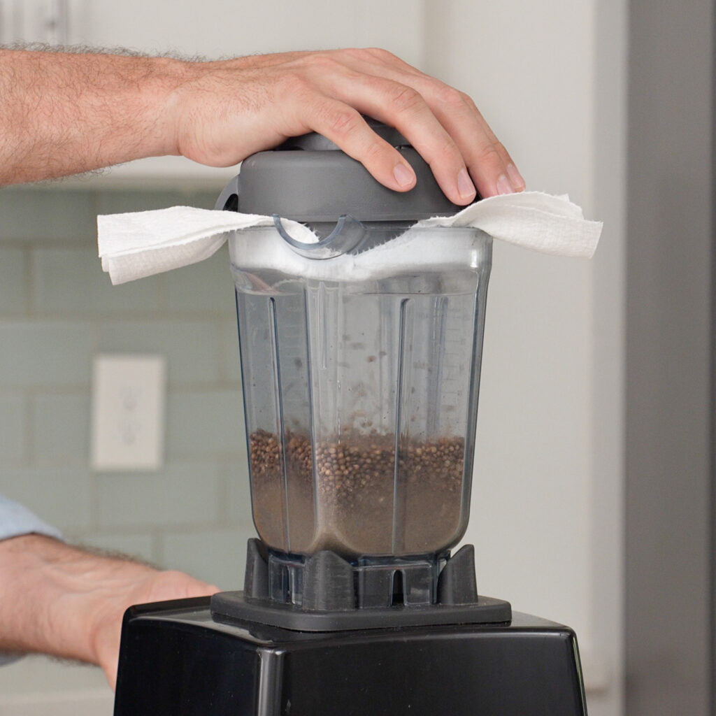 grinding pastrami spices in a blender jar