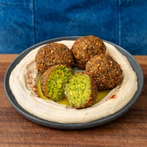 fried-falafel-balls-on-hummus