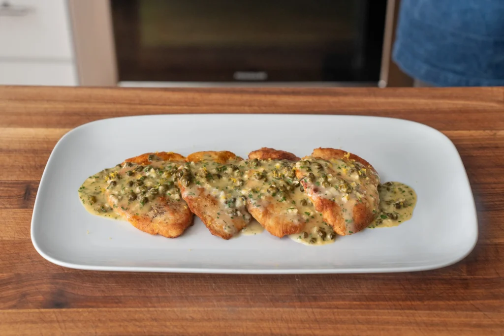 chicken piccata on a platter