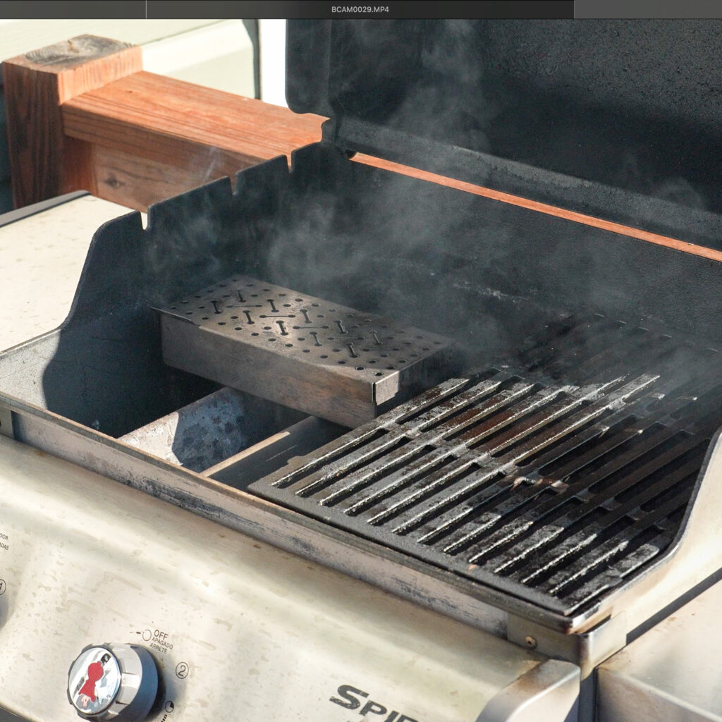 smoker box smoking on a gas trill