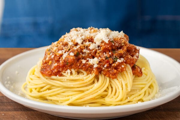 spaghetti with meat sauce on top