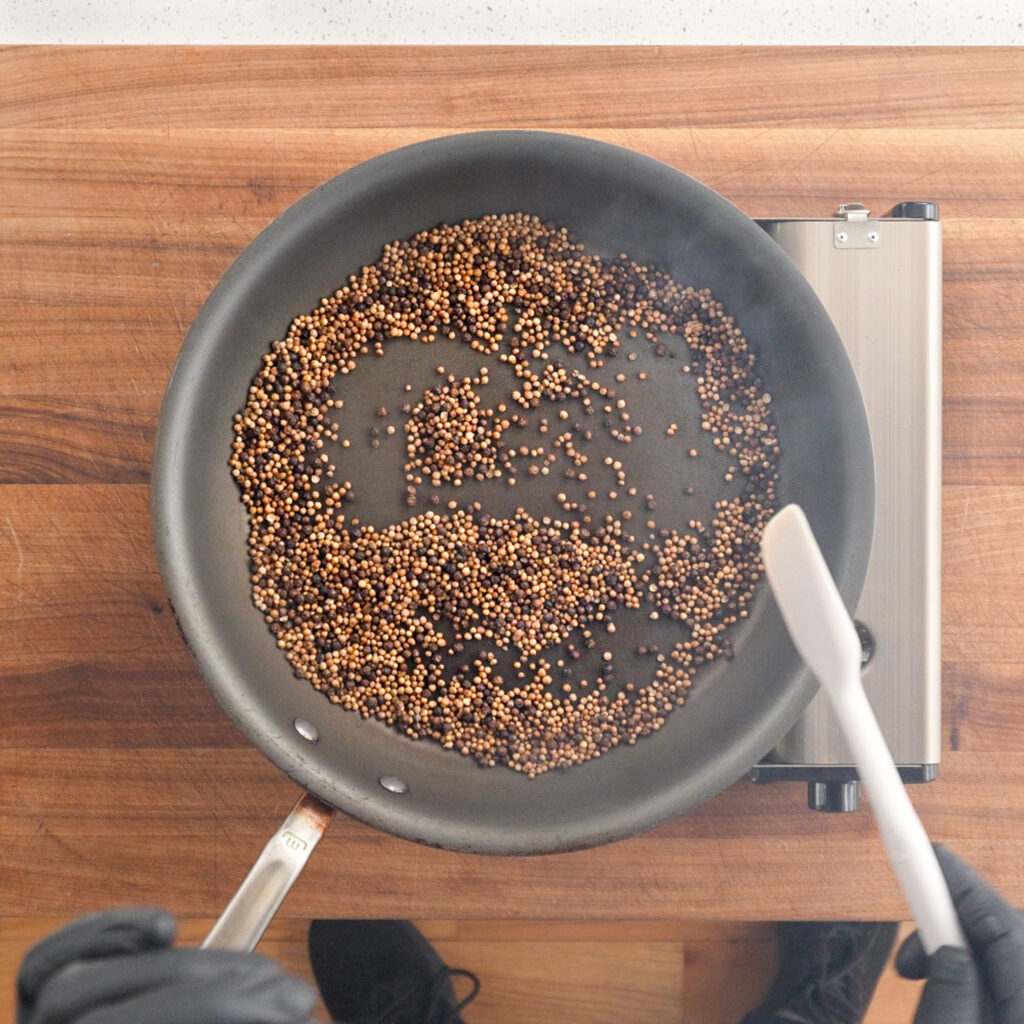 toasting spices in a nonstick pan