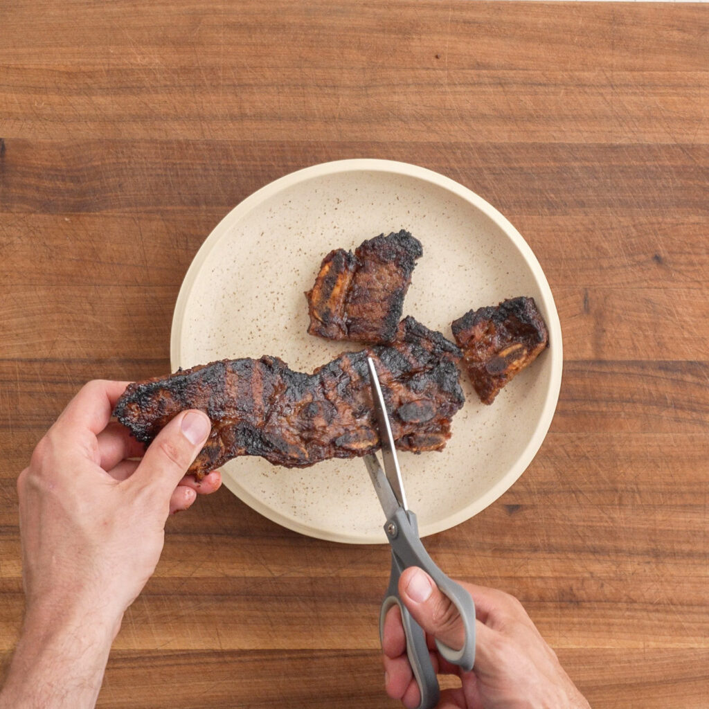 cutting korean short ribs between the bones