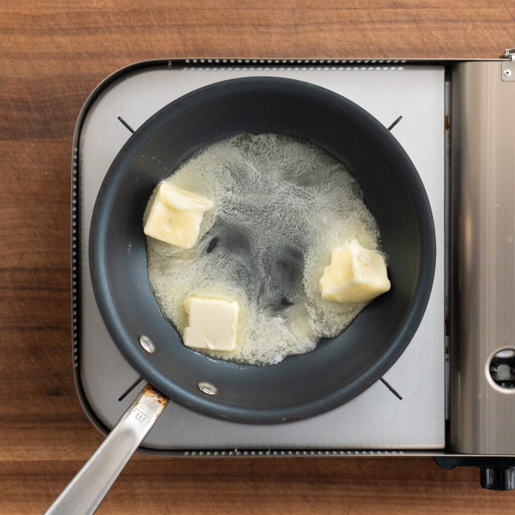 butter melting in saute pan