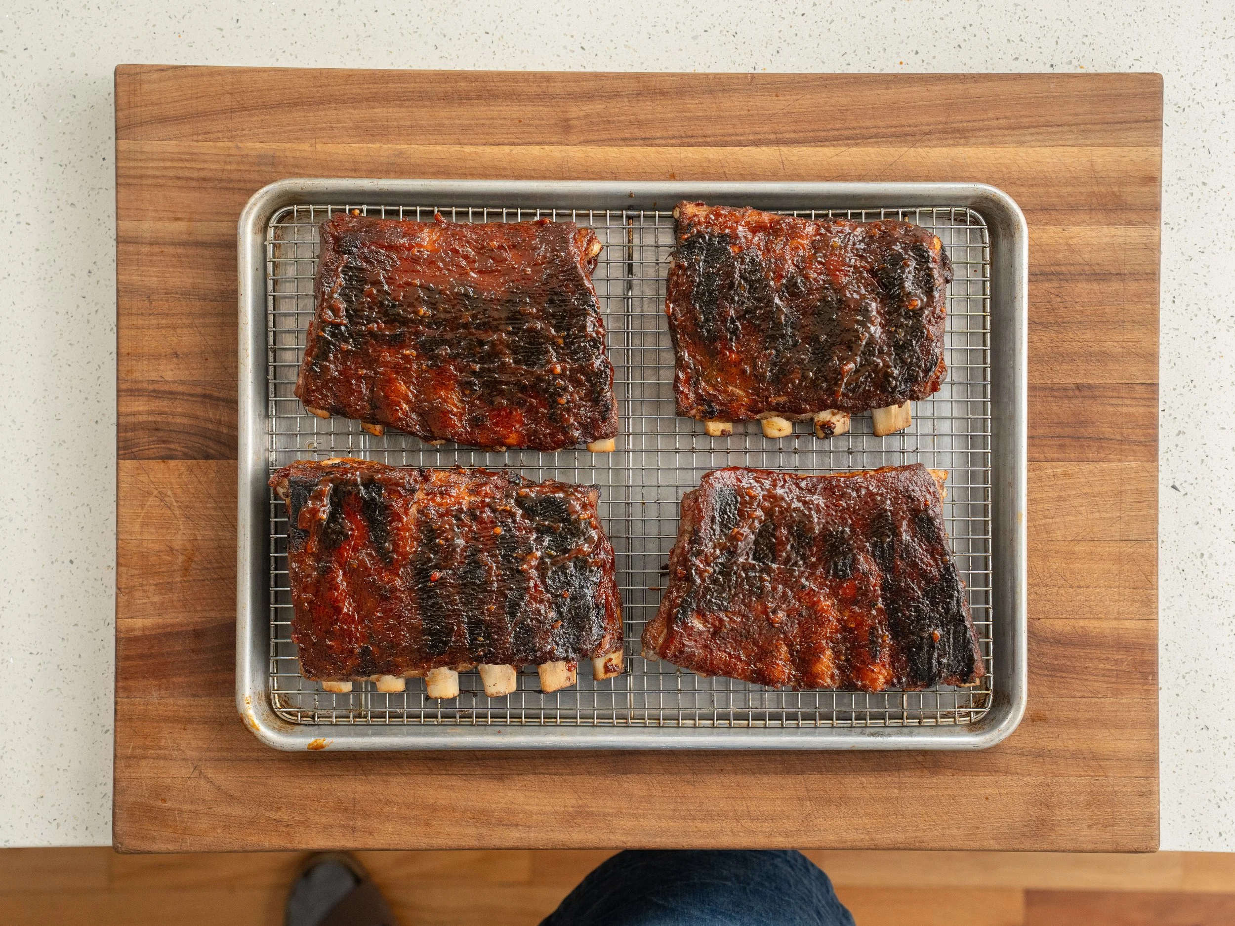 4 grilled half slabs st Louis ribs on tray