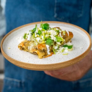 enchiladas verde on a stone plate