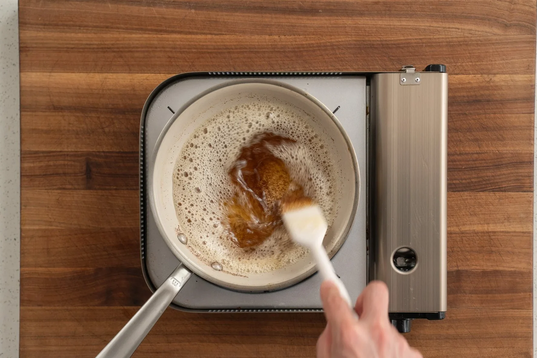 brown butter in a small sauce pan on a burner