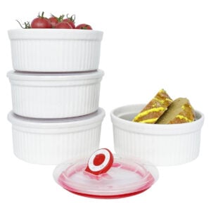 4 white ramekins with tomatoes and bread inside