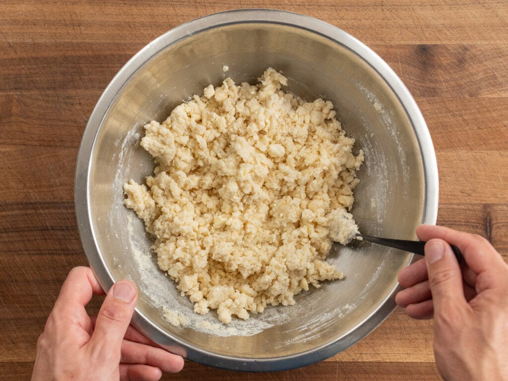 finished drop biscuit dough in silver bowl