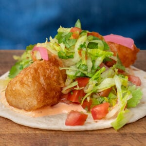 Baja Fish taco on cutting board