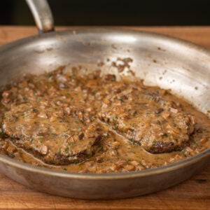 steak diane in silver saute pan